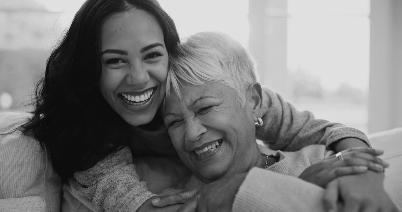 A woman hugging her mom